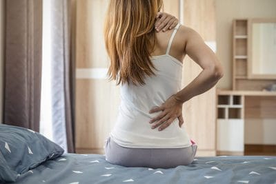 Sunset Chiropractic & Wellness. Back Pain Causes, Symptoms, and Treatment. In our lives we encounter 2 types of physical stress on our spinal structures.